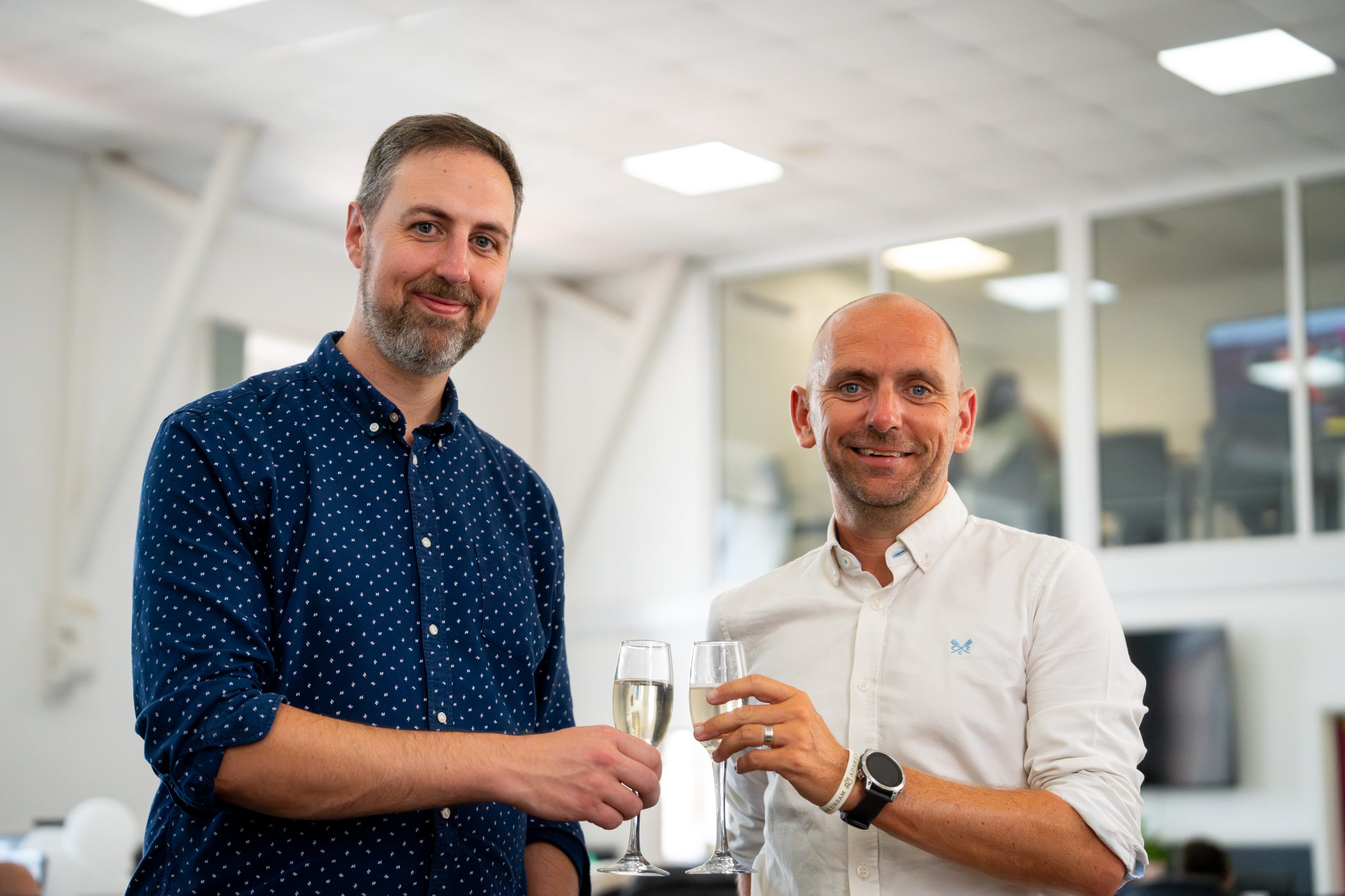 Simon & Tom toast with glasses