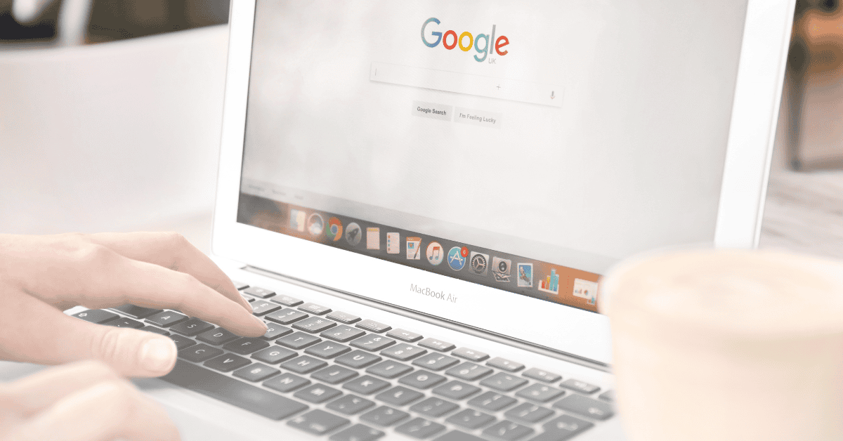 Someone typing on a laptop with Google on their screen. Showcasing one section of paid media opportunities.